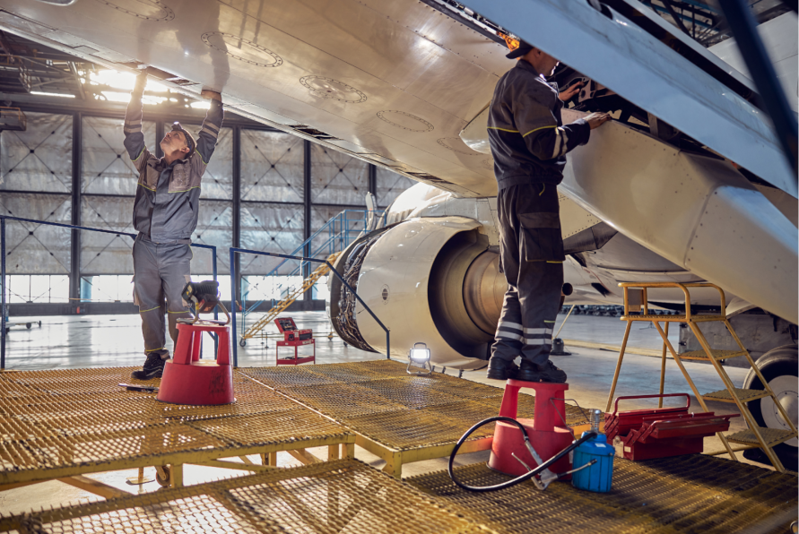 Engineer giving maintenance to an aircraft after identifying a potential failure