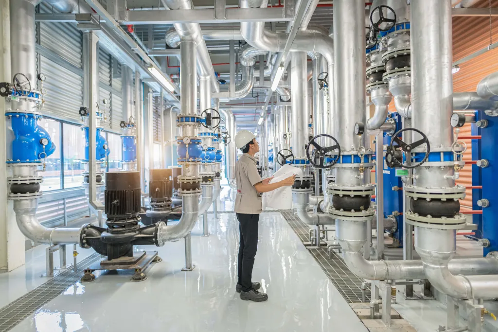 Change Management in Organizations: Becoming Data-Driven engineer checking factory assets