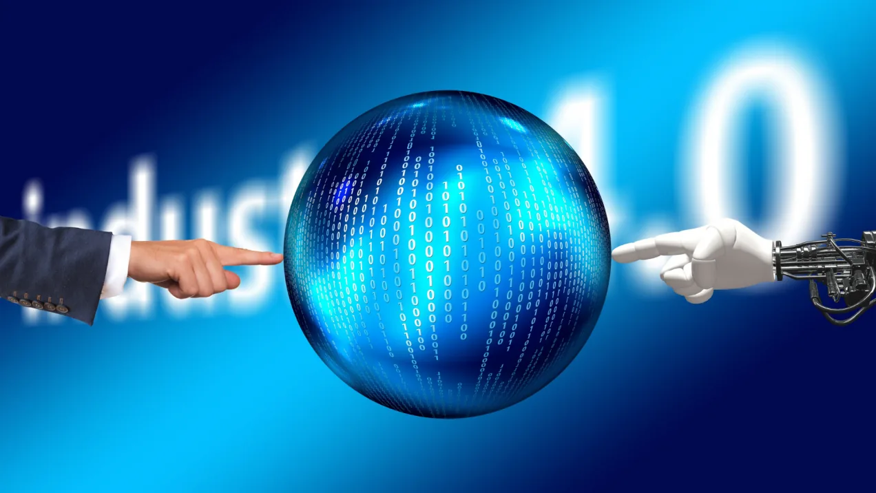 OEM 4.0 – Three Ways Valve and Pump Manufacturers Can Turn Data into Dollars Industry 4.0 concept showing human and robotic collaboration with predictive analytics — representing data-driven manufacturing innovation