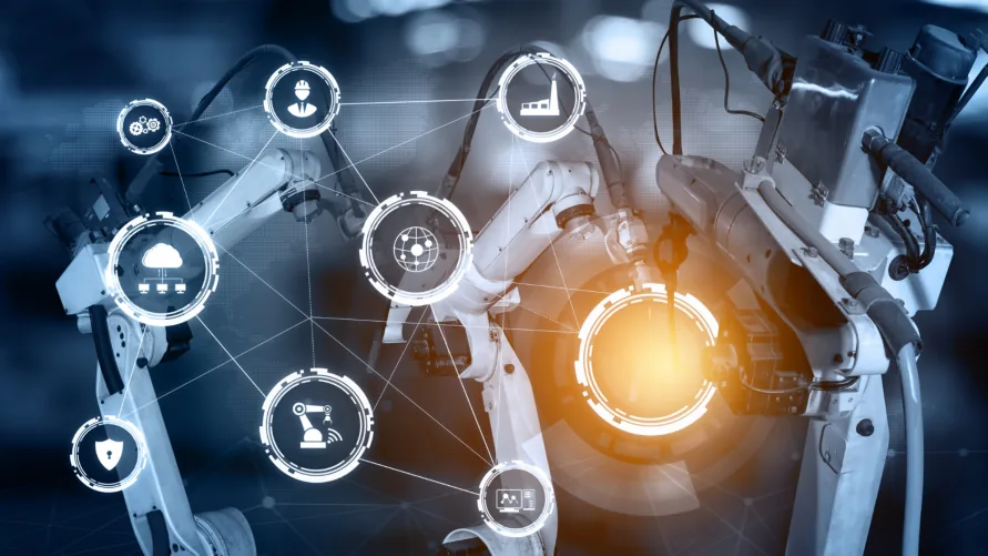Robotic arms overlaid with connected icons for cloud, factory, analytics and security, with a glowing ring at the centre.