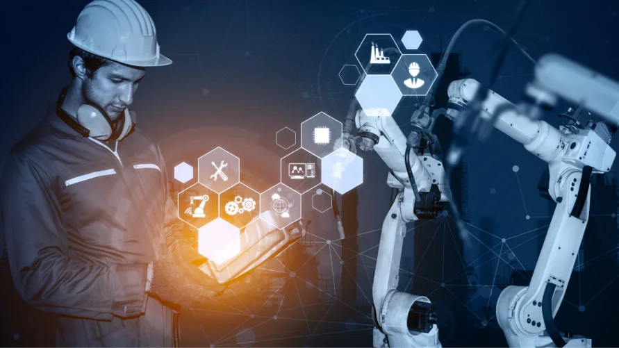 The Myth of Predictive Maintenance? Engineer looking at predictive analytics of a robotic arm