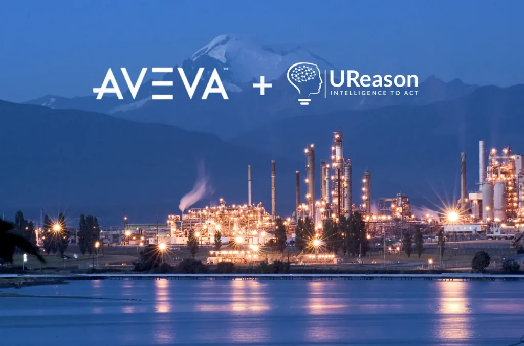AVEVA and UReason logos above a petrochemical plant lit at dusk and reflected in the water in front of it.