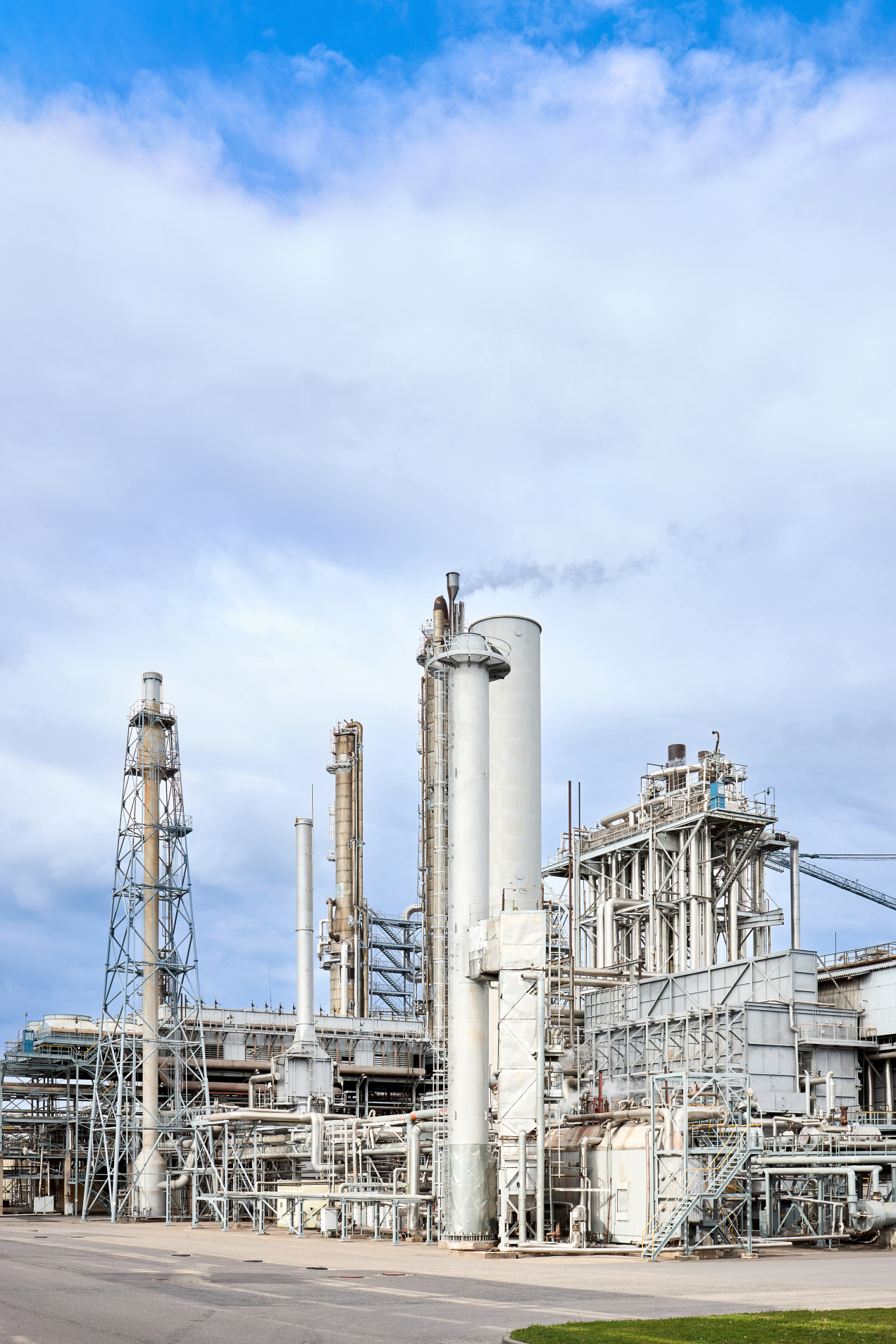 Exterior of modern petrochemical plant with reactors and converters