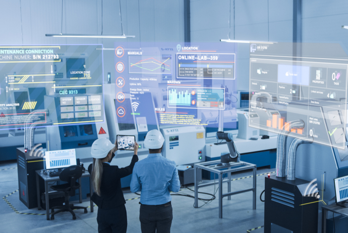 Two engineers viewing an analytics screen