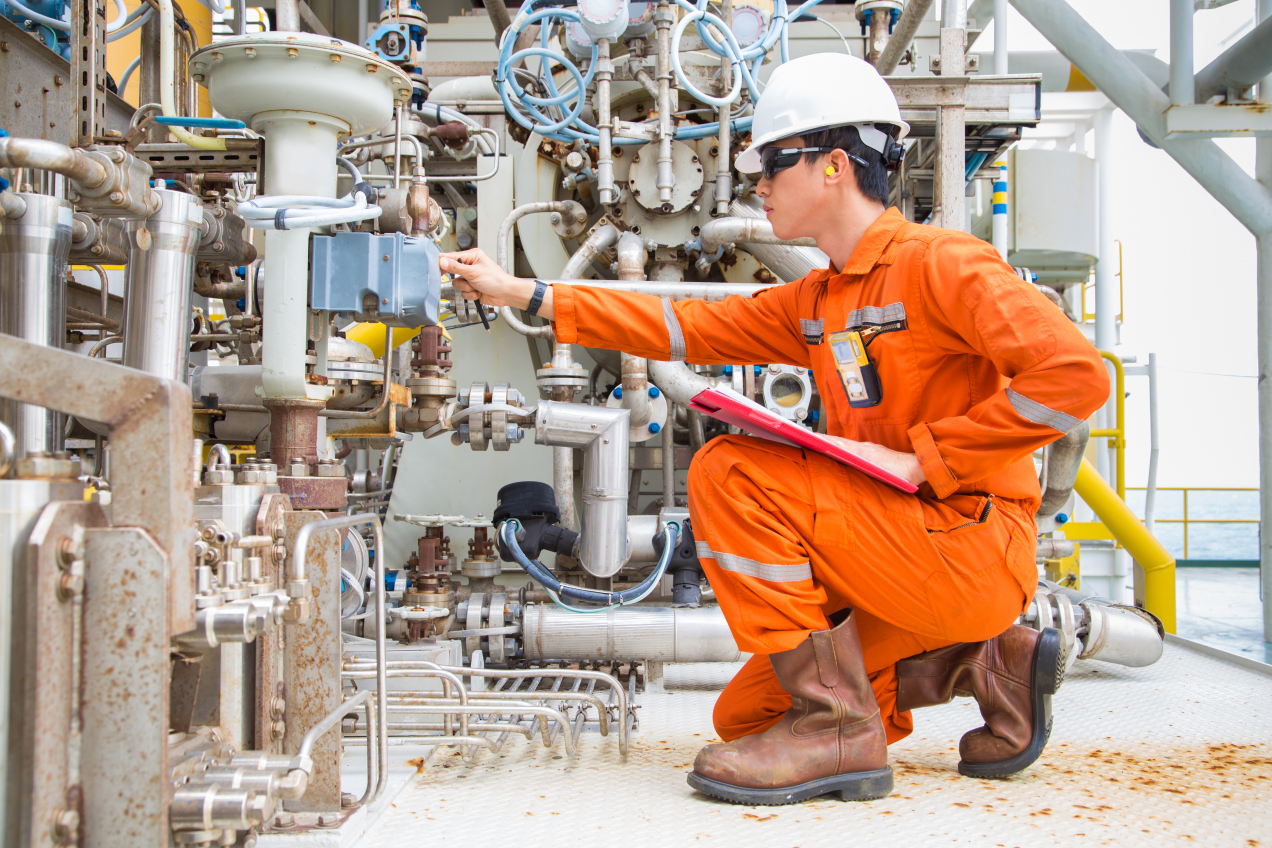 Mechanical Engineer doing a check on gas control valve